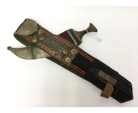 An Arab Jambiah dagger from North Yemen given to the owner in 1980/81 while working in the region. 23cm long double edged bla