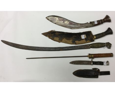 Two Kukri knives: one without scabbard with plated 32cm blade and one with scabbard a/f without the two knives with 29cm blad