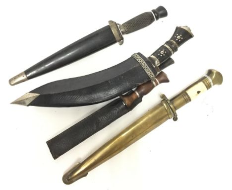 A collection of Indian made knives and a souvenir Kukri. (4) The first has a brass and bone grip with an etched 19cm double e