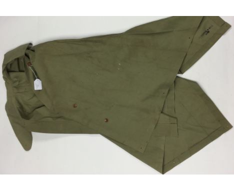 WW2 British Army rubberised Poncho. Maker marked and dated "Silberston & Son 1944" Complete with all buttons.