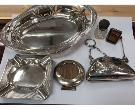 Group silver to include purse, two miniature photograph frames, ashtray, salt spoon, silver topped glass bottle and  Continen