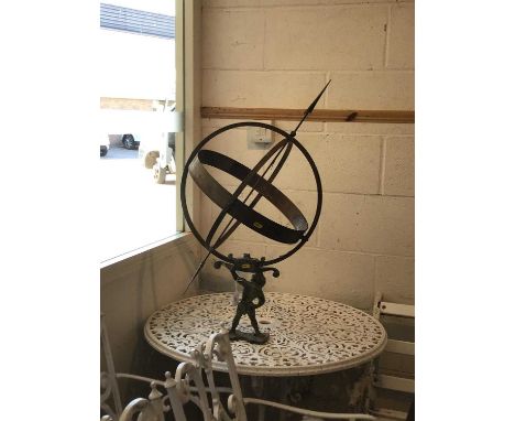 Copper sundial with figure support