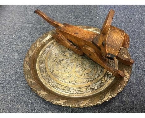 Scratch built articulated model of a dog, 35cm long, together with an Islamic inlaid dish. (2)