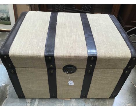 Contemporary leather bound padded trunk