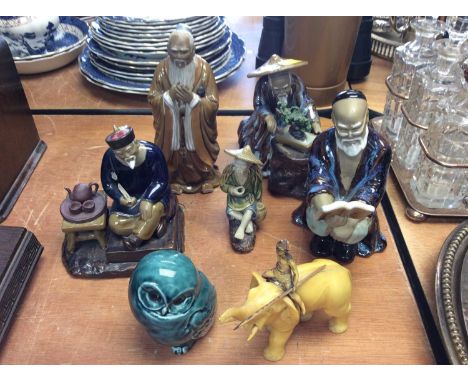 Oriental figures and Poole Pottery owl