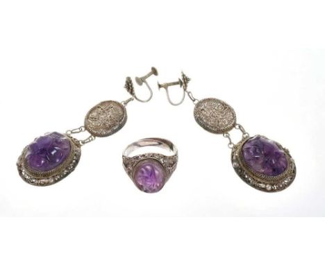 Chinese white metal earrings and matching ring with carved amethyst cabochons in filigree settings.Condition report: Earrings