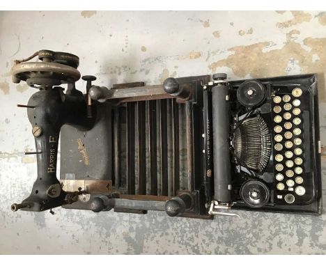 Vintage Underwood manual typewriter, Harris sewing machine and metal foot scraper