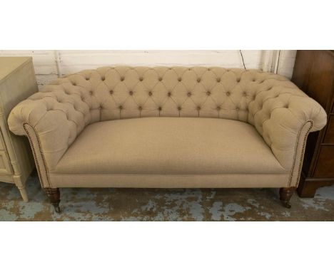 CHESTERFIELD SOFA, 168cm W x 79cm H x 68cm D, Victorian walnut in taupe fabric, (front castors ceramic, rear brass). 