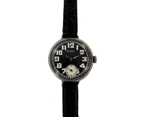 Rolex - An early 20th century Swiss silver trench style wristwatch, model number 2906, the signed circular black dial, 30mm d