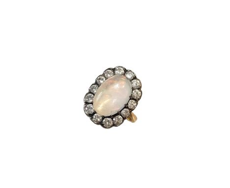 An opal and diamond cluster ring, claw set oval shaped cabochon opal, approximately 14.75 x 10mm, estimated approximate weigh