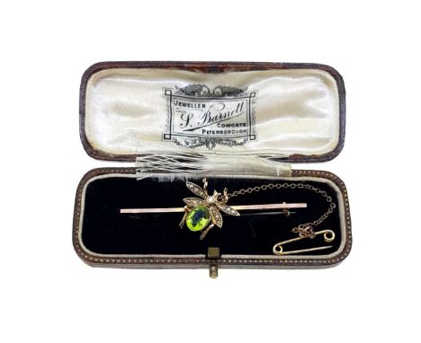 A demantoid garnet and split pearl insect brooch, the abdomen set with an oval faceted demantoid garnet, approximately 7.8 x 