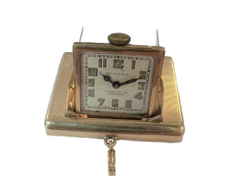 Tavannes for Dunhill - A 9ct gold 'La Captive' desk watch, circa 1929, the tandem signed cream coloured square dial, 18mm wid