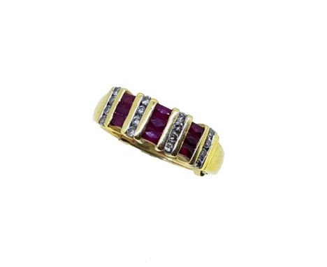 A modern ruby and diamond ring, three rows of rectangular faceted rubies and four rows of round brilliant cut diamonds, estim