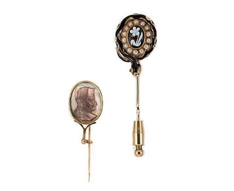 An enamelled mourning stick pin, together with a cameo stick pin, the oval mourning pin designed as a coiled black enamelled 