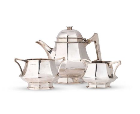 A George V silver 3-piece tea set, mark of Walker &amp; Hall, Sheffield 1922, the teapot of octagonal panelled form and in th