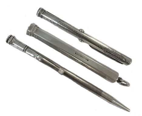 A trio of silver writing implements, the first, a silver pencil holder, mark of Sampson Mordan, London 1890 (? date letter ru