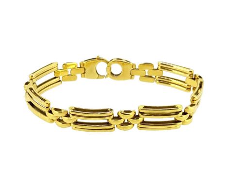 An 18ct gold stylized gate bracelet, alternate rectangular bar and brick style links, length 20cm, width 1.1cm, trigger clasp