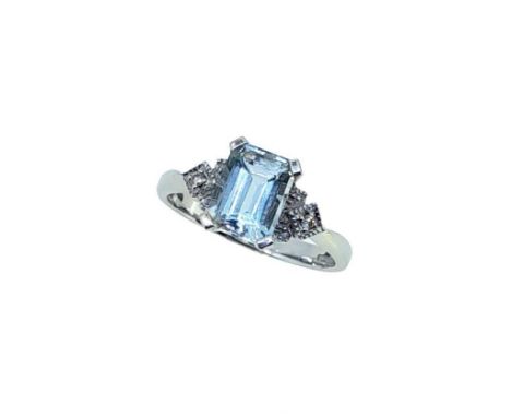 An 18ct gold aquamarine and diamond ring, claw set octagonal aquamarine, approximately 8 x 6mm, estimated approximate weight 