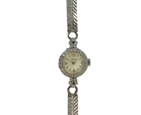 J.W. Benson - A diamond set cocktail watch, circa 1950, the signed circular cream coloured dial, 12mm diameter, with gold col