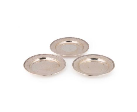 A trio of early 20th century Danish metalwares silver side plates, mark of Georg Jensen, circa 1926, model 210H, each stamped