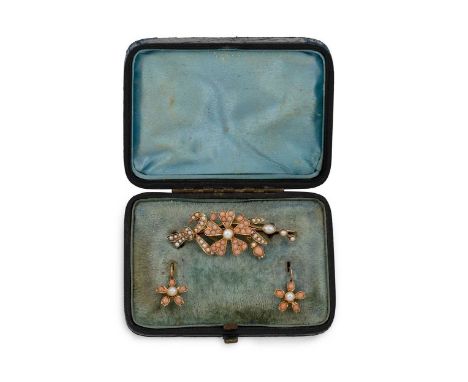 A pearl and coral brooch and ear pendant suite, the floral brooch set with a central pearl, surrounded by coral petals, split