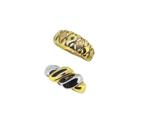 Two dress rings, first, a yellow metal ring with a pierced tapered head, matt and polished finish, plain polished shank, size