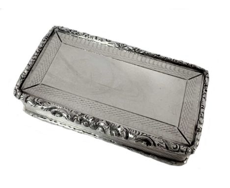 A Victorian silver snuff box, mark of Francis Clark, Birmingham 1838, of rectangular form, decorated top and bottom with engi