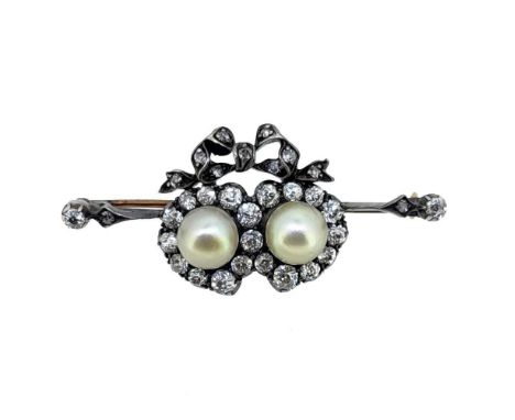 A Victorian pearl and diamond brooch, two hearts, each set with a button shaped pearl, surrounded by old brilliant cut diamon