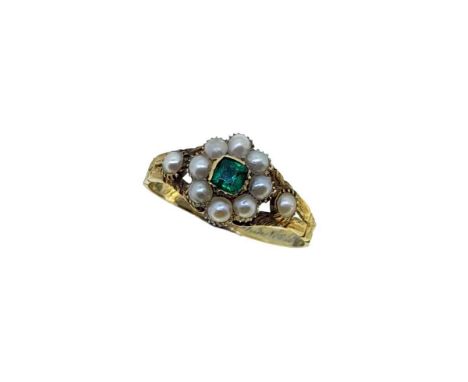 A 19th Century emerald and pearl memorial cluster ring, central cushion shaped foil backed emerald, approximate diameter 3mm,