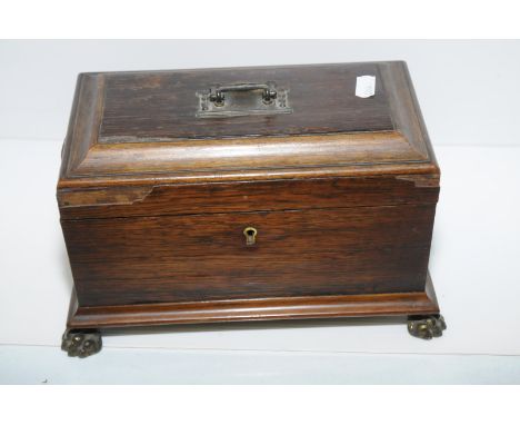 Mahogany tea caddy on brass claw feet