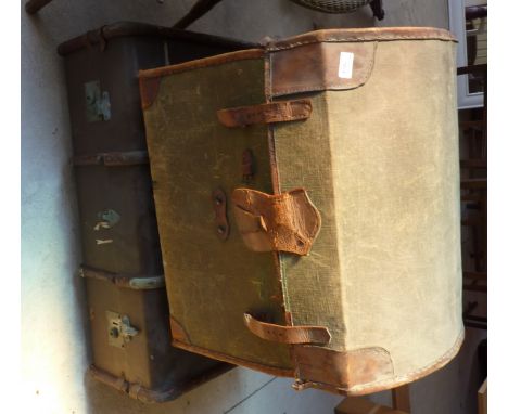 Leather and canvas domed trunk and wood and leather travel trunk