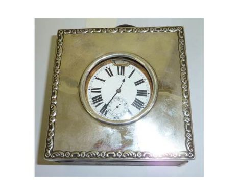 Scarce cased travelling electrified Goliath pocket watch the white enamel face with secondary dial and illuminating panel, in