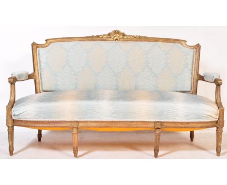 19th century French gilt wood and gesso worked Canape sofa settee. Raised on reeded&nbsp; and turned legs with show wood fram