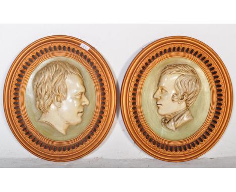 A pair of vintage 20th Century Scottish rounded portrait silhouettes. Walter Scott &amp; R Burns. With gilt and repeating geo