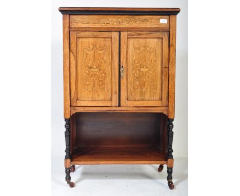 An Edwardian rosewood and inlaid marquetry pedestal cabinet cupboard having a straight flared top over a fitted inlaid frieze