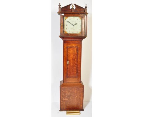 A 19th century mahogany longcase grandfather clock. The clock having a swan neck pediment with dentils to edge. The clock fac