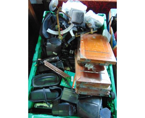 A box containing a large selection of vintage cameras and photographic equipment to include approx. twenty seven vintage came