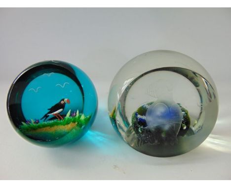 A boxed Caithness Puffin paperweight, edition 67, (style 3) with descriptive card reading - A finely lamp-worked interpretati
