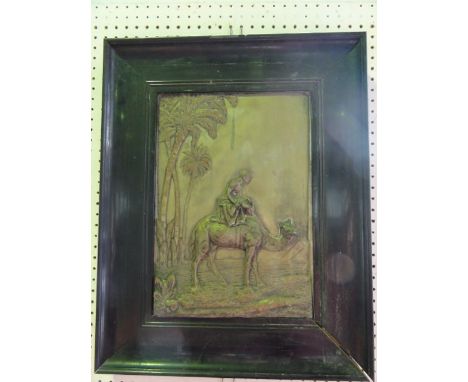 A late 19th century framed silver plated panel with relief decoration depicting a seated Egyptian male astride a camel, set b