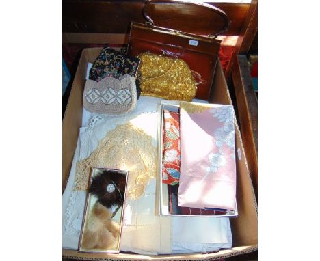 A good quality, possibly 18th Century lacework collar together with a box containing an assortment of vintage domestic linen 