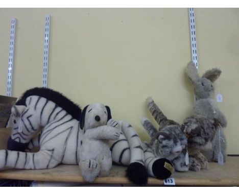 A large Merrythought stuffed toy in the form of a zebra, two Steiff models of kittens, a pedigree bunny rabbit and a Snoopy s