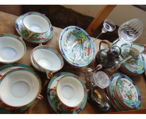 A quantity of Coalport dinner wares with polychrome chinoiserie pattern decoration comprising a pair of oval serving dishes, 