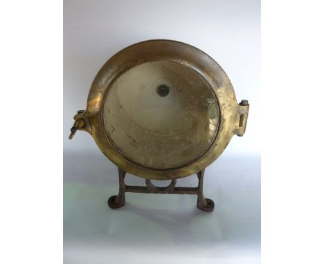 A good quality late 19th/early 20th century bulkhead lamp unit, the cylindrical housing interior with remnants of original wh