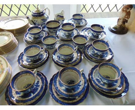 A quantity of Booths Real Old Willow pattern blue and white printed tea wares, No A8025 comprising teapot, milk jug, sugar bo