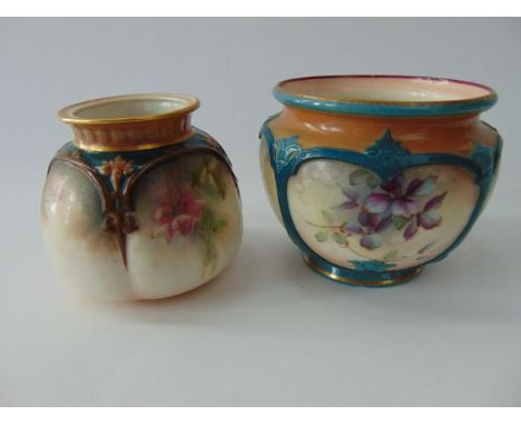 Two Hadley Worcester vases of squat form, one with painted yellow and pink rose decoration beneath moulded shoulders, with pa