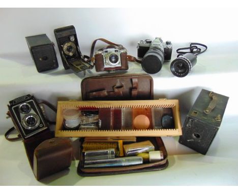 An assortment of vintage photographic equipment to include aluminium case containing a Asahi Pentax Spotmatic camera together