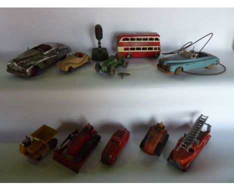 A box containing an assortment of vintage model vehicles to include a tin plated Tri-Ang Minictoys double decker bus, No LBL 