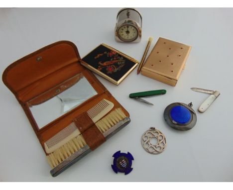 A silver and guilloche enamelled compact, Levi & Salaman, Birmingham, of circular form, gilt interior; a cased hair brush and