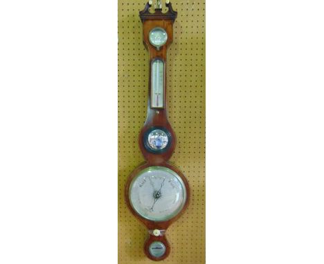 A Georgian mahogany wheel barometer with string banded inlay , with silvered dials and convex mirror panel
