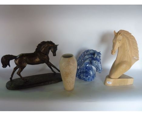 A resin model of a galloping horse with patina type finish together with a carved timber study of a horses bust, a ceramic ho